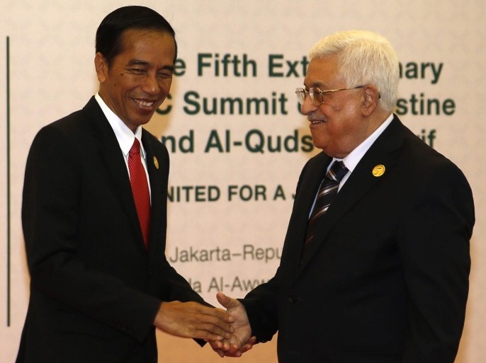 Indonesian President Joko Widodo (L) welcomes Palestinian President Mahmoud Abbas during the 5th Extraordinary Organization of Islamic Cooperation (OIC) Summit on Palestinian issues in Jakarta, Indonesia, 07 March 2016. Indonesian President Joko Widodo urged Israel to end the occupation of Palestinian territories, saying international patience 'has long run out,' at the opening of the summit. The summit, organized at the request of the Palestinian Authority, planned to discuss the deteriorating situation in Palestinian territories and reaffirm the grouping's support for Palestinian independence.