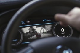 The dashboard panel of Nissan's automated driving test vehicle shows the test vehicle detecting other car during a test drive in Tokyo, Tuesday, Nov. 3, 2015. Nissan Motor Co.'s "intelligent driving" feature is smart enough to navigate intersections without lane markers. It also brakes safely to a stop without crashing into the vehicle in front, and it knows the difference between a red light and a tail-lamp. (AP Photo/Eugene Hoshiko)