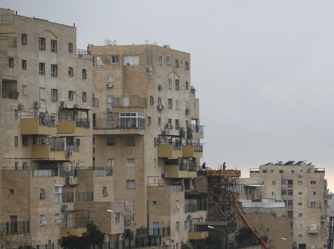 A building under construction is seen in the West Bank Jewish settlement of Beitar Illit January 27, 2016. The United States, European Union and the United Nations have issued unusually stern criticism of Israel, provoking a sharp response from Prime Minister Benjamin Netanyahu and raising Palestinians' hopes of steps against their neighbour. REUTERS/Amir Cohen