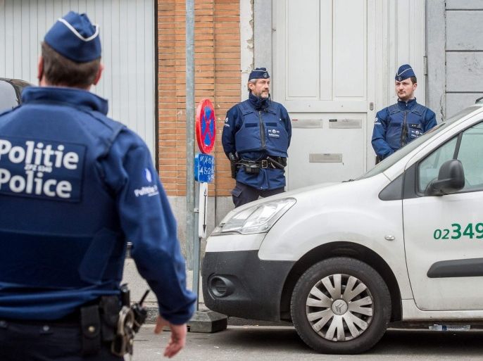 Belgium police outside 79 Quatre-Vents in in the Molenbeek neighborhood of Brussels, Belgium, 19 March 2016, where terror suspect Salah Abdeslam was arrested after an anti-terror operation in Molenbeek, 18 March 2016. Paris attack suspect Salah Abdeslam, linked to last year's Paris terror attacks, was wounded in the leg in the operation in which shots were fired and grenades were thrown, as confirmed by the police to the Belgian media.