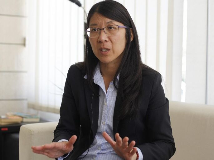 Joanne Liu, international president of Doctors Without Borders , speaks at their office in Amman, Jordan on Tuesday, March 1, 2016. Liu says the medical charity's teams have seen a "marked decrease" in air strikes and shelling in Syria since a cease-fire went into effect late last week. She told the Associated Press that the group, also known by its French acronym MSF, is ready to get more aid to hard-hit areas, but wants to see first if the limited truce will hold. (AP Photo/Sam McNeil)