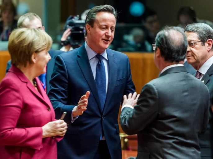 German Chancellor Angela Merkel, left, speaks with from right, Cypriot President Nicos Anastasiades, French President Francois Hollande and British Prime Minister David Cameron during a round table meeting at an EU summit in Brussels on Thursday, March 17, 2016. The president of Cyprus says Turkey must open its airports and ports to Cypriot ships and planes if it wants to join the European Union, in a standoff hampering efforts to seal an EU-Turkey migrant agreement. (AP Photo/Geert Vanden Wijngaert)