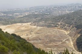 A general view shows the Naameh landfill, south of Beirut, Lebanon July 22, 2015. Activists and residents of Naameh are blocking a road leading to the landfill, preventing garbage trucks to reach the landfill and empty their charge. The streets of Beirut are quickly becoming host to growing mountain of garbage after a crisis in the gvernment’s waste management policy led to a halt in garbage collection and raising concerns for health and environmental adverse effects. REUTERS/Aziz Taher