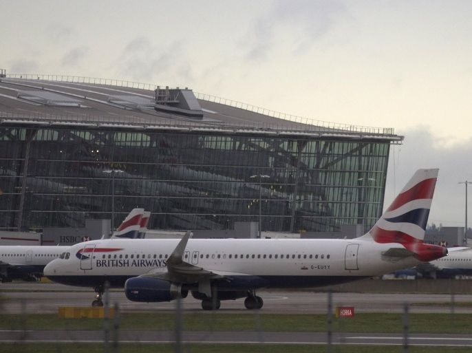A British Airways plane taxis at Heathrow Airport near London, Britain, December 11, 2015. REUTERS/Neil Hall