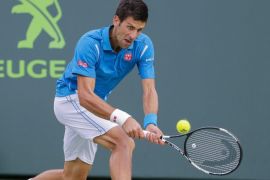 Novak Djokovic of Serbia in action against Dominic Thiem of Austria during a fourth round match at the Miami Open tennis tournament on Key Biscayne, Miami, Florida, USA, 29 March 2016.