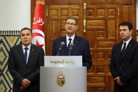 Tunisian Defense minister Farhat Horchani (L), Tunisian Prime Minister Habib Essid (C) and Tunisia Interior Minister Hedi Majdoub (R) during a press conference after an emergency cabinet meeting in Tunis, Tunisia, 08 March 2016. The death toll from clashes between Tunisian security forces and unidentified insurgents near the border with Libya is 54, the Interior Ministry said a day earlier. The clashes broke out when gunmen attempted to storm military and security barracks and other sites at dawn Monday in Begardene, near the Libyan border. Tunisia has experienced a series of deadly attacks during the past year. The Islamic State terrorist group, which is active in Libya, has claimed responsibility for some of the attacks, including a shooting spree that killed 21 tourists and a police officer at the Bardo museum in the heart of Tunis.