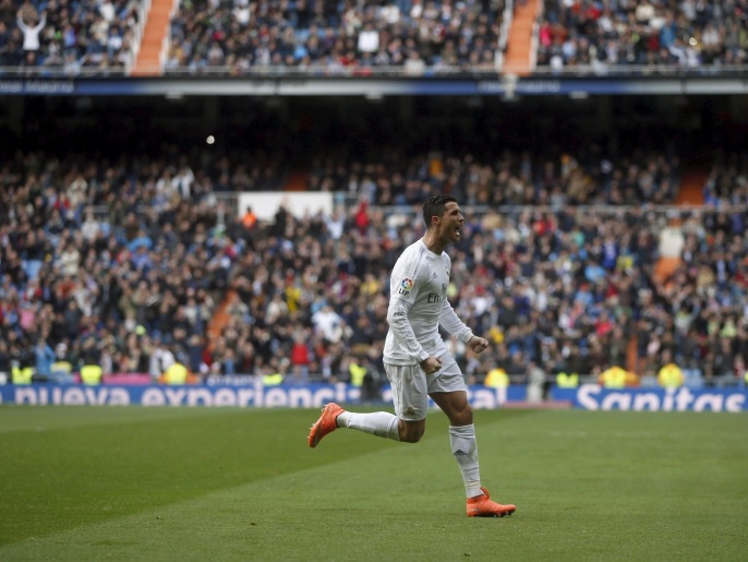   رونالدو محتفلا بأحد أهدافه الأربعة بمرمى سيلتا فيغو بالدوري الإسباني (رويترز)