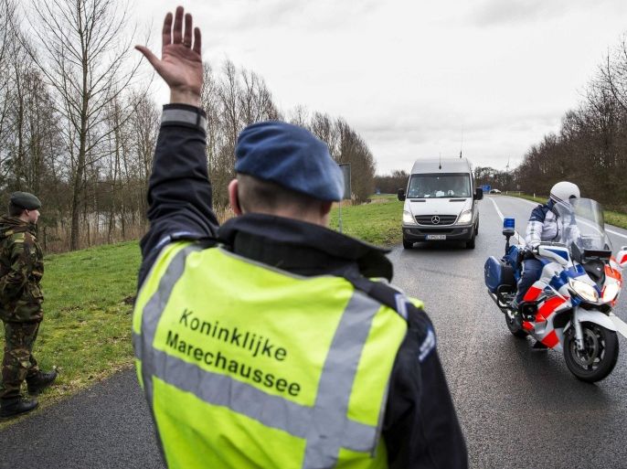 Staff of the Mobile Surveillance Security (MTV) of the Royal Military Marechaussee, the Dutch national police forces, during an inspection near the German border in De Lutte, The Netherlands, 08 February 2016. The mobile teams of the military police extended their checks in the border region to see if more refugees come to the Netherlands and to stop human smuggling.