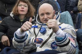 FILE - In this Wednesday, March 2, 2016 photo provided by NASA, International Space Station (ISS) crew member Scott Kelly of the U.S. reacts after landing near the town of Dzhezkazgan, Kazakhstan. On Friday, March 11, 2016, NASA announced Kelly's retirement, which begins April 1. The 52-year-old Kelly holds the American record for most time in space: 520 days. (Bill Ingalls/NASA via AP)