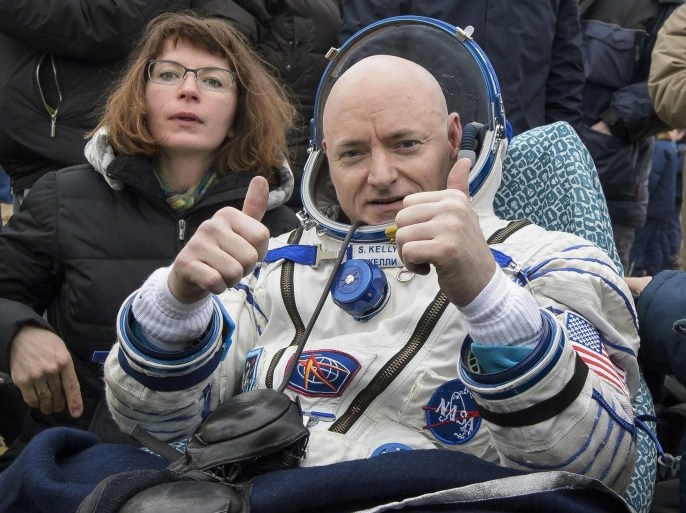 FILE - In this Wednesday, March 2, 2016 photo provided by NASA, International Space Station (ISS) crew member Scott Kelly of the U.S. reacts after landing near the town of Dzhezkazgan, Kazakhstan. On Friday, March 11, 2016, NASA announced Kelly's retirement, which begins April 1. The 52-year-old Kelly holds the American record for most time in space: 520 days. (Bill Ingalls/NASA via AP)