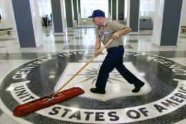 FILE - In this March 3, 2005 file photo, a workman slides a dustmop over the floor at the Central Intelligence Agency headquarters in Langley, Va. Senate investigators have delivered a damning indictment of CIA interrogation practices after the 9/11 attacks, accusing the agency of inflicting pain and suffering on prisoners with tactics that went well beyond legal limits. The torture report released Tuesday by the Senate Intelligence Committee says the CIA deceived the nation with its insistence that the harsh interrogation tactics had saved lives. It says those claims are unsubstantiated by the CIA's own records. (AP Photo/J. Scott Applewhite)