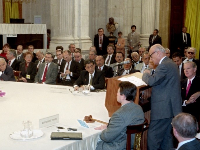 epa01130508 (FILE) A file photograph from erly November 1991 of Palestinian negotiator Haidar Abdel Shafi (at podium) as he leads the Palestinian team at the Madrid Middle East Peace Conference. At right is then US Secretary of State James Baker. The Israeli Prime Minister Yitzhak Shamir (2nd,L) listens along with Amr Moussa, then Egyptian Foreign Minister and now head of the Arab League (R at table). Shafi, a leading Palestinian nationalist and physician, died at his home in the Gaza Strip from stomach cancer on 25 September 2007. He was 88. In 1993 Shafi resigned his negotiating post over the Oslo peace agreements with Israel and was known as a die-hard critic of Palestinian leader yasser Arafat and his concessions to the Israelis in peace talks. EPA/JIM HOLLANDER