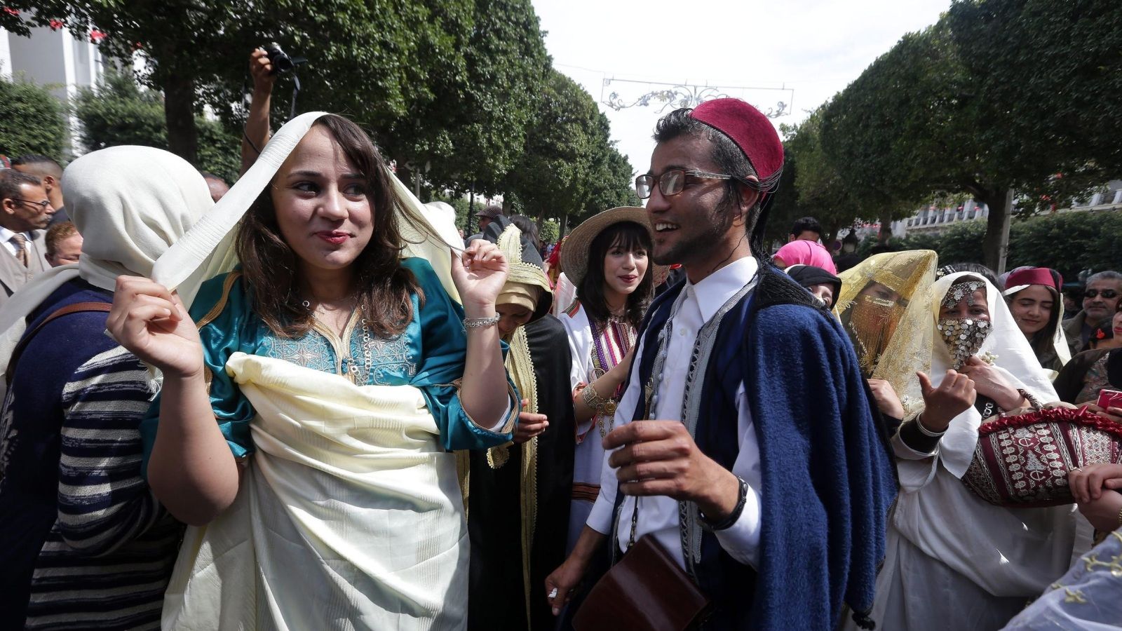 Tunisians wear the traditional veil, or 'Sefseri', during a celebration to commemorate Tunisian National Day in Tunis, Tunisia, 20 March 2016. The day commemorates the country's independence from France in 1956.