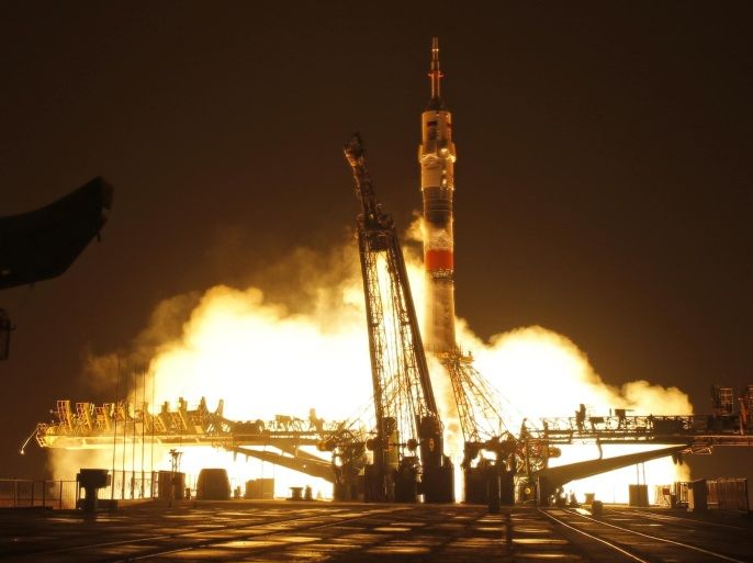 The Soyuz-FG rocket booster with Soyuz TMA-20M space ship carrying a new crew to the International Space Station, ISS, blasts off at the Russian leased Baikonur cosmodrome, Kazakhstan, Saturday, March 19, 2016. The Russian rocket carries NASA astronaut Jeff Williams and Russian cosmonauts, Oleg Skripochka and Alexei Ovchinin of Roscosmos. (AP Photo/Dmitri Lovetsky)