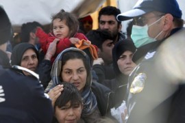 Refugees on the Greek side of the border wait to enter Macedonia, near Gevgelija, The Former Yugoslav Republic of Macedonia, 02 March 2016. The chaotic scenes at Greece's border with Macedonia, where thousands of migrants are stranded, are a 'direct result' of border closures across Europe and Austria's cap on arrivals, Human Rights Watch said on 01 March 2016. In Geneva, the UN refugee agency UNHCR warned that Greece and countries along the Balkan migration route were headed for 'disaster' unless they return to a common approach of solidarity and shared responsibility.