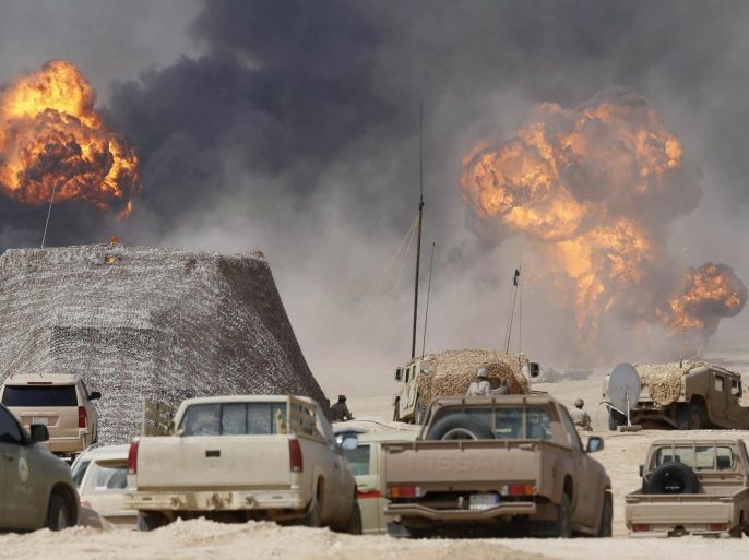Fireballs from nearby explosions rise in the air as troops from Saudi Arabia and 20 allied countries perform in the final exercises of the military manoeuvre codenamed 'North Thunder' in Hafar al-Batin, Saudi Arabia, 10 March 2016. The 'North Thunder' military excerices started in mid-February in the north-eastern Saudi town of Hafr al-Batin.
