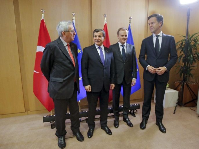 European Commission President Jean-Claude Juncker (L-R), Turkish Prime Minister Ahmet Davutoglu, European Council President Donald Tusk and Dutch Prime Minister Mark Rutte pose prior to a meeting during two-days European Union leaders summit in Brussels, Belgium, 18 March 2016. Davutoglu attended a breakfast meeting as EU leaders are discussing a deal with Turkey that is aimed to tackle the migration crisis and curb migration into the bloc.