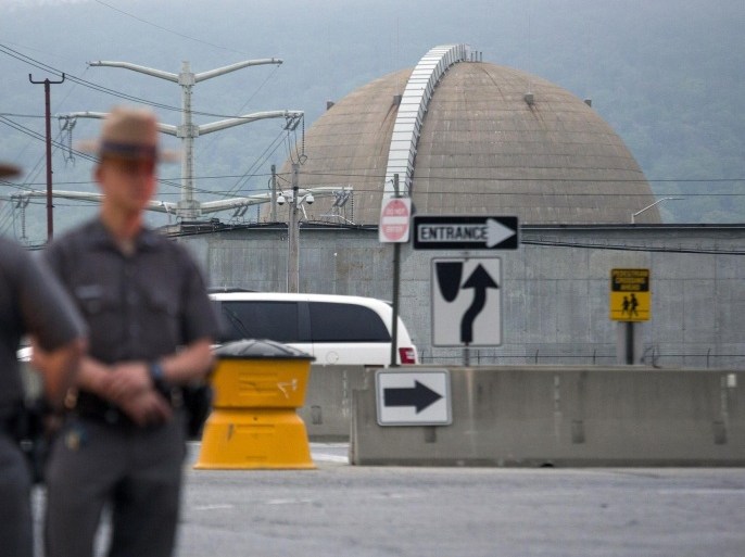 New York State Troopers stand at the main entrance of the Indian Point nuclear power plant Saturday May 9, 2015, after a transformer failed at New York's Indian Point 3 nuclear power plant, causing a fire that has been extinguished in Buchanan, N.Y. A spokesman for Entergy says the unit has shut down automatically and is safe and stable. (AP Photo/Craig Ruttle)