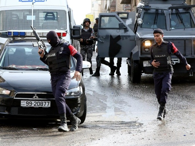 Jordanian Policemen stand guard at Hakama street in Irbid city north of Amman, Jordan, 02 March 2016. A police captain and four outlaws were killed in a major crackdown launched by the security forces against outlaws in the northern city of Irbid. Two bystanders were injured in the ongoing operation by security forces in Irbid, a police source announced, adding that one of the outlaws was arrested in the operation.