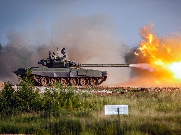 A Russian tank T-72B3 fires at the field show programs during the International Military-Technical Forum 'ARMY-2015' in the Russian Armed Forces 'Patriot' park in Kubinka, Moscow region, Russia, 16 June 2015. Hundreds of the Russian defense companies and weapon manufacturers will take part in the event, displaying an estimated 5,000 pieces of weaponry and military equipment, ranging from helicopters and fighter jets to tanks and small arms.