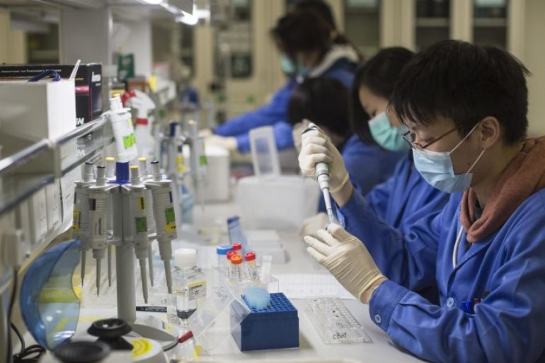 Lab technicians work on preparation work for sequencing in a Beijing Genomics Institute (BGI) facility in Hong Kong, China, 02 December 2015. A team of scientists at BGI, a leading genome sequencing organization, has launched a crowd funding project to sequence the genome of the Bauhinia tree. It will be the first Hong Kong genome project, funded by the public, sequenced in Hong Kong as well as assembled and analysed by local students and directly shared with the public. The flower of the orchid tree Bauhinia blakeana has been the emblem of Hong Kong since 1965 and has been part of the flag of the Hong Kong Special Administrative Region since the handover to China in 1997.