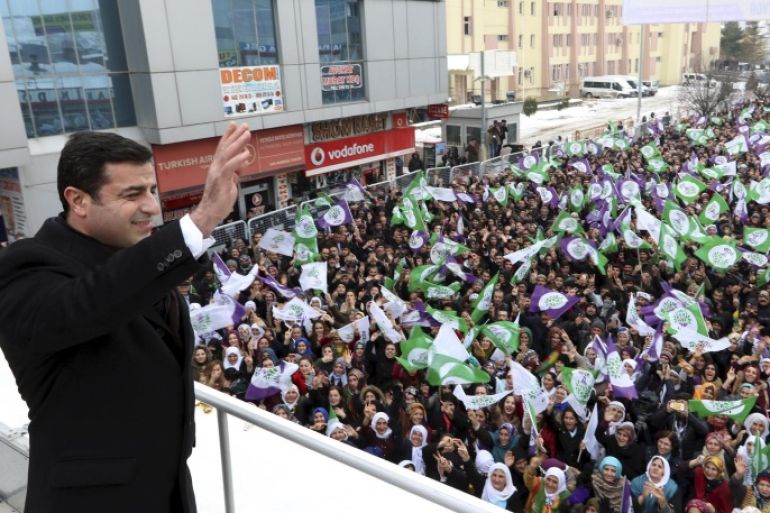 REFILE - CLARIFYING RESTRICTIONSSelahattin Demirtas, co-leader of the pro-Kurdish Peoples' Democratic Party (HDP), greets his supporters during a rally to protest against security operations in the Kurdish dominated southeast, in the eastern city of Van, Turkey, January 7, 2016. REUTERS/Bedran BabatEDITORIAL USE ONLY. NO RESALES. NO ARCHIVE. TPX IMAGES OF THE DAY