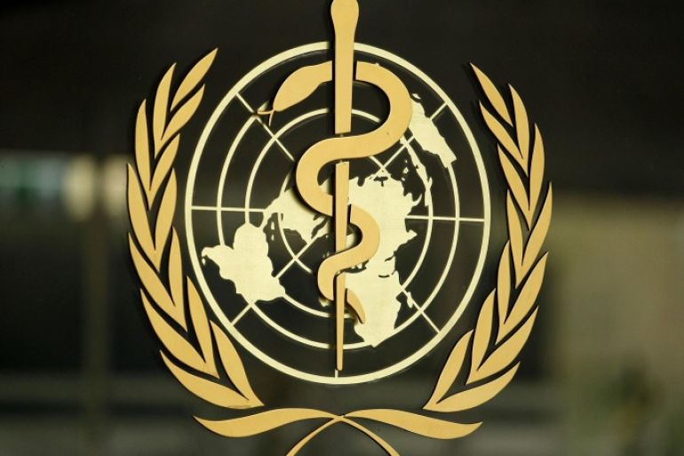 The World Health Organization (WHO) logo is pictured at the entrance of its headquarters in Geneva, January 25, 2015. REUTERS/Pierre Albouy (SWITZERLAND - Tags: HEALTH)