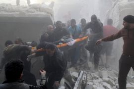 ATTENTION EDITORS - VISUAL COVERAGE OF SCENES OF DEATH AND INJURY Residents and Civil Defense members carry the body of an elderly woman on a stretcher amidst rubble of damaged buildings after an air strike on the rebel held al-Saliheen district in Aleppo, Syria, March 11, 2016. REUTERS/Abdalrhman Ismail