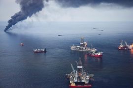 (FILE) A file photo dated 19 June 2010 showing oil from the BP Deepwater Horizon oil spill being corralled and burned on the surface of the Gulf of Mexico 50 miles off the coast of Louisiana, USA. Reports on 02 July 2015 state the US government and Gulf States have agreed on a tentative settlement whereby British BP is to pay compensation for damages caused by the Deepwater Horizon oil spill. According to the settlement, BP will pay 18,7 billion USD in damage compensation over a period of 18 years. EPA/BEVIL KNAPP *** Local Caption *** 50241815