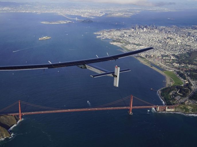 A handout photo provided by Global Newsroom on 23 April 2016 shows 'Solar Impulse 2', a solar powered plane piloted by Swiss adventurer Bertrand Piccard, flying over the Golden Gate bridge in San Francisco, California, USA, 23 April 2016, after a flight from Hawaii, where he took off on 21 April for a non-stop three day flight to cover about 3,760 kilometers. EPA/JEAN REVILLARD / HANDOUT