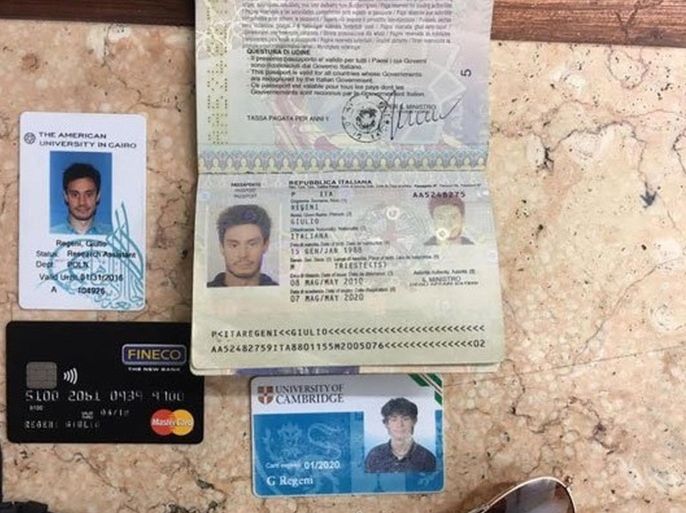 FILE -- In this file photo released by the Egyptian Ministry of Interior on Thursday, Mar. 24, 2016, personal belongings of slain Italian graduate student Giulio Regeni, including his passport, are displayed. On Sunday, April 3, 2016 the editor of Egypt's top state newspaper called on Egyptian authorities to seriously deal with the case of an Italian student tortured and killed in Cairo, saying officials who didn't realize the gravity of the case are risking Egyptian-Italian relations. Italian Premier Matteo Renzi has insisted Italy will settle for nothing less than the truth. (Egyptian Interior Ministry via AP, File)