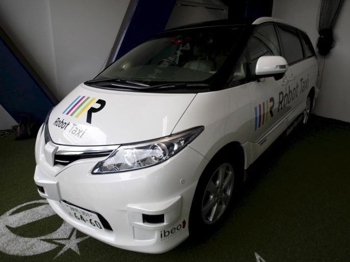 Robot Taxi Inc.'s Robot Taxi, a self-driving taxi based on a Toyota Estima car body, is seen during an unveiling ceremony in Yokohama, south of Tokyo, Japan, October 1, 2015 file photo. Japan's Robot Taxi aims to forge partnerships with carmakers to develop a driverless taxi service in time for the 2020 Olympics, the technology company said, holding its first tests on public roads and joining a global race to develop self-driving cars. REUTERS/Yuya Shino/Files
