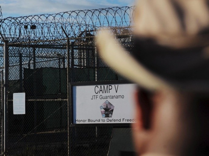 The outside of the "Camp Five" detention facility is seen at U.S. Naval Station Guantanamo Bay December 10, 2008 in this pool image reviewed by the U.S. military. Nearly two-thirds of Americans believe torture can be justified to extract information from suspected terrorists, according to a Reuters/Ipsos poll, a level of support similar to that seen in countries like Nigeria where militant attacks are common. To match Exclusive USA-ELECTION/TORTURE REUTERS/Mandel Ngan/Pool