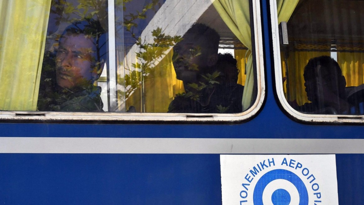 Migrants looks out from a bus after arriving at the port of Kalmata in South Peloponnese, Greece, 17 April 2016. According to media reports, 41 refugees were collected from a wooden ship outside of Pylos.