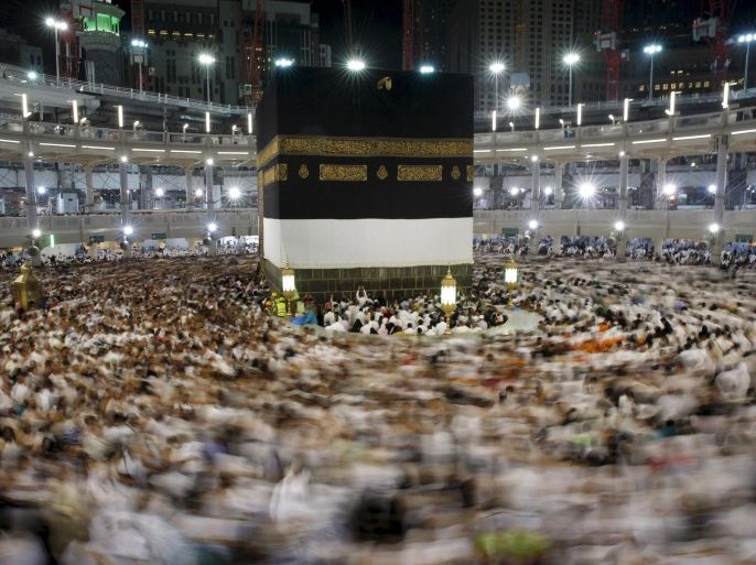 Muslim pilgrims pray around the holy Kaaba at the Grand Mosque ahead of the annual haj pilgrimage in Mecca in this September 22, 2015 file photo. Pilgrims reported feeling the hands of their relatives slip away into the crowd on Thursday morning when a crush at the Mina camp in Mecca killed at least 769 in the deadliest haj disaster in a generation. REUTERS/Ahmad Masood/Files