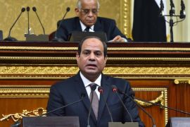 A handout photograph made available by the Egyptian Presidency shows Egyptian President Abdel Fattah al-Sisi (bottom) speaking in front of lawmakers as Speaker of the Egyptian Parliament Ali Abdel-Al (top) listens at the Parliament, in Cairo, Egypt, 13 February 2016. Al-Sisi on 13 February delivered his first speech in front of the newly convened parliament. The 569-member assembly met for its inaugural session on 10 January 2016. EPA/EGYPTIAN PRESIDENCY/HANDOUT