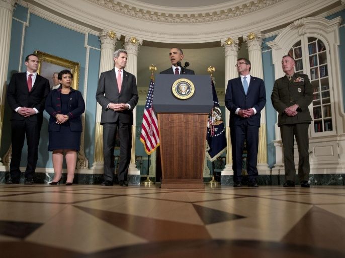 President Barack Obama speaks after hosting a meeting of his National Security Council (NSC) at the State Department in Washington, Thursday, Feb. 25, 2016. The meeting focused on the global campaign to degrade and destroy ISIL as well as Syria and other regional issues. Standing with the president from left, Brett McGurk, Special Presidential Envoy for the Global Coalition to Counter ISIL, Office of the Special Presidential Envoy for the Global Coalition to Counter ISIL, Attorney General Loretta Lynch, Secretary of State John Kerry, the president, Defense Secretary Ash Carter, and Joint Chiefs Chairman Gen. Joseph Dunford. Obama is directing his national security team to press the U.S.-led international campaign to destroy the Islamic State group "on all fronts." (AP Photo/Carolyn Kaster)