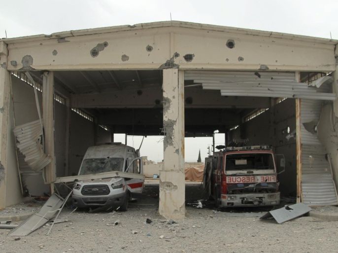 Damaged rescue vehicles are pictured inside a Civil Defence station in the rebel held town of Atareb, Aleppo countryside, Syria April 26, 2016. REUTERS/Ammar Abdullah