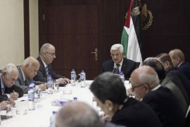 FILE - In this April 18, 2015, file photo, Palestinian President Mahmoud Abbas, center, chairs a meeting of the PLO executive committee in the West Bank city of Ramallah. Documents recently leaked online detailing two attempts by Palestinian officials to misuse public funds have triggered outrage, highlighting the corruption and mismanagement critics say remains rampant in the Palestinian government. Palestinian Authority officials have defended their record on stamping out corruption, saying they’ve recovered millions of dollars in misspent funds. (AP Photo/Fadi Arouri, Pool, File)