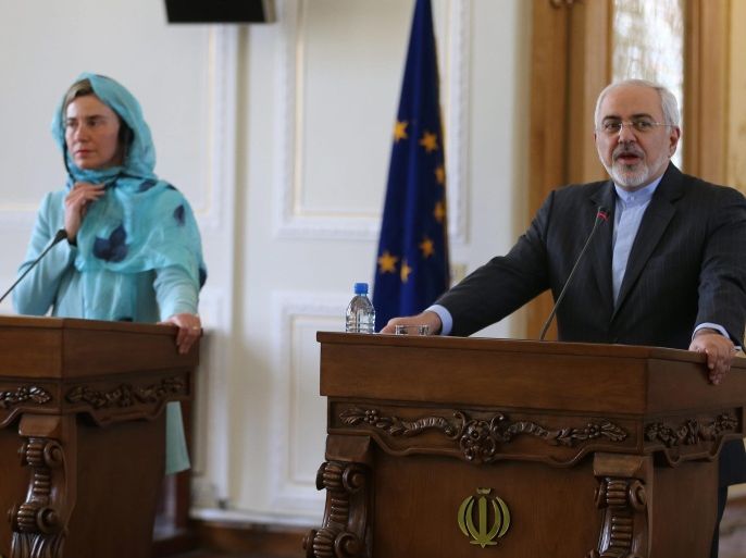 Iranian foreign minister Mohammad Javad Zarif (R) speak during a joint press conference with EU foreign policy chief Federica Mogherini (L), Tehran, Iran, 16 April 2016. Mogherini is on a one-day visit to Tehran to meet with Iranian officials.