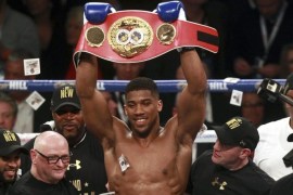 British boxer Anthony Joshua celebrates after winning against US boxer Charles Martin during their World IBF Heavyweight title fight at the 02 Arena in Dockland's London, Britain, 09 April 2016.