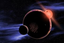 The artist's conception shows a hypothetical planet with two moons orbiting in the habitable zone of a red dwarf star NASA copy