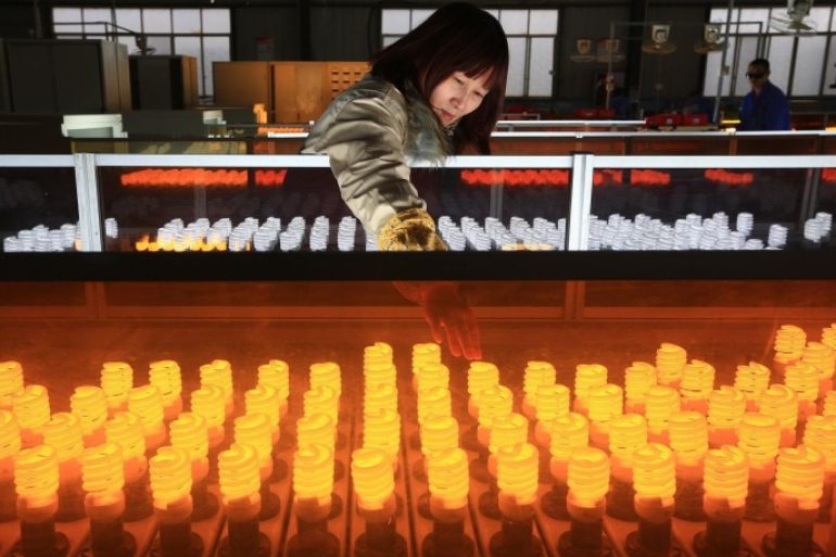 (FILE) A file photo dated 04 January 2016 showing a woman working on the production line of energy-saving lamps in a factory in Suining in southwest China's Sichuan province, China. China's industrial sector showed signs of expansion in March, after seven months of contraction, according to the Purchasing Managers' Index, PMI, published every month by the National Bureau of Statistics of China. The PMI rose to 50.2 points in March, up from February's 49 points. The indicator above 50 points marks the expansion of the manufacturing sector while the indicator below 50 reveals reduction in industrial activity. The National Bureau of Statistics also published 01 April 2016 the PMI of the service sector, which stood at 53.8 points after two months of a downward trend (53.5 points in January and 52.7 February). EPA/ZHONG MIN CHINA OUT