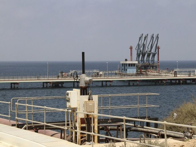 A general view of Libya's Hariga port in Tobruk, east of Benghazi June 28, 2014. Libya's acting Prime Minister Abdullah al-Thinni said on July 3, 2014 the government had reached a deal with Ibrahim Jathran, a rebel leader controlling oil ports, to hand over the last two terminals of Ras Lanuf and Es Sider and end a blockade that crippled the OPEC nation's petroleum industry. Thinni said the ports had been reclaimed after an agreement with Jathran, whose fighters had seized the terminals almost a year ago to demand more regional autonomy. Jathran's rebels and their allies, who were all former state oil protection guards before their mutiny, had agreed in April to reopen the two smaller ports, Zueitina and Hariga, and then gradually free up Es Sider and Ras Lanuf. Picture taken June 28, 2014. To match LIBYA-OIL/ REUTERS/Stringer (LIBYA - Tags: CIVIL UNREST POLITICS ENERGY BUSINESS)