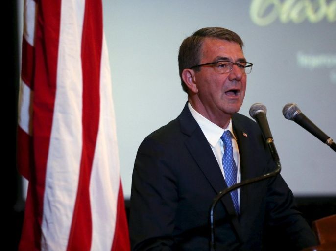 U.S. Defence Secretary Ash Carter speaks next to U.S. and Philippine flags during the closing ceremony of a U.S.-Philippine military exercise dubbed "Balikatan" (shoulder to shoulder) at Camp Aguinaldo in Quezon City, Metro Manila April 15, 2016. REUTERS/Erik De Castro