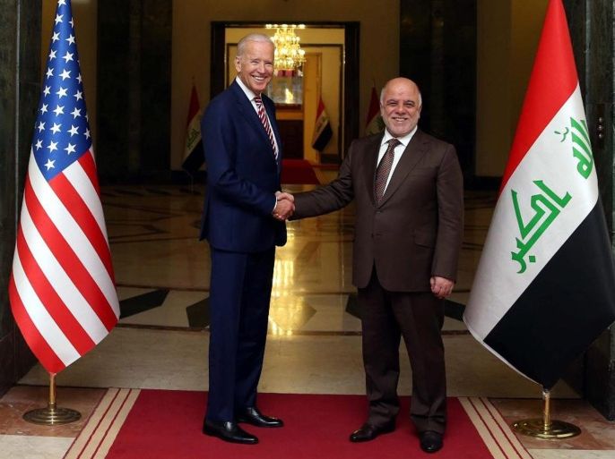 A handout picture released by Iraqi Prime Minister's office shows Iraqi Prime Minister Haider al-Abadi (R) greet US Vice President Joe Biden (L) in Baghdad, Iraq, 28 April 2016. Joe Biden is on a surprise visit to Iraq to help resolve the political issues in the country.