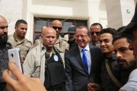 The Special Representative of the UN Secretary-General and Head of the United Nations Support Mission in Libya Martin Kobler (C) takes pictures with Libyans after a press conference in the building of Tripoli Municipality in Algeria Square, Tripoli, Libya, 05 April 2016. This is Kobler's first visit since the arrival of Libya Presidency Council on 12 March 2016.