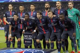 PSG players poses for a team photo prior to the Champions League group A soccer match against Real Madrid at the Parc des Princes stadium in Paris, Wednesday, Oct. 21, 2015. (AP Photo/Michel Euler)