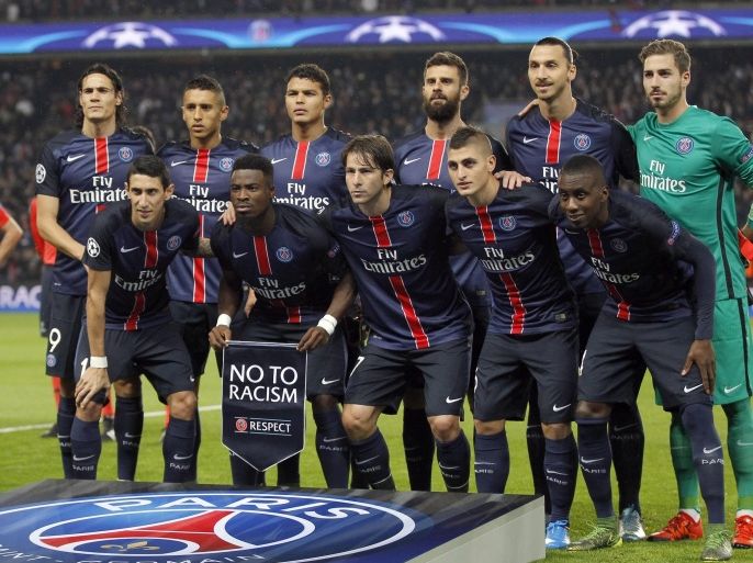 PSG players poses for a team photo prior to the Champions League group A soccer match against Real Madrid at the Parc des Princes stadium in Paris, Wednesday, Oct. 21, 2015. (AP Photo/Michel Euler)