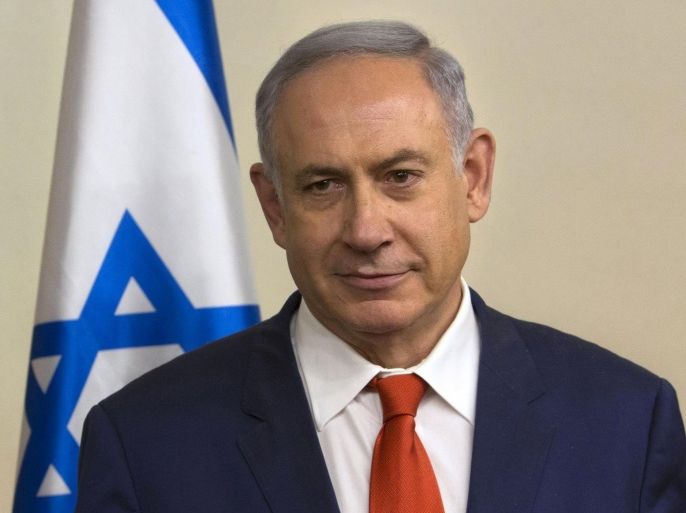 Israeli Prime Minister Benjamin Netanyahu looks on at his office in Jerusalem April 4, 2016. REUETRS/Sebastian Scheiner/Pool